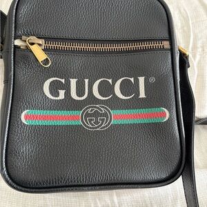 Gucci Black Leather Messenger Bag with Gold Accents